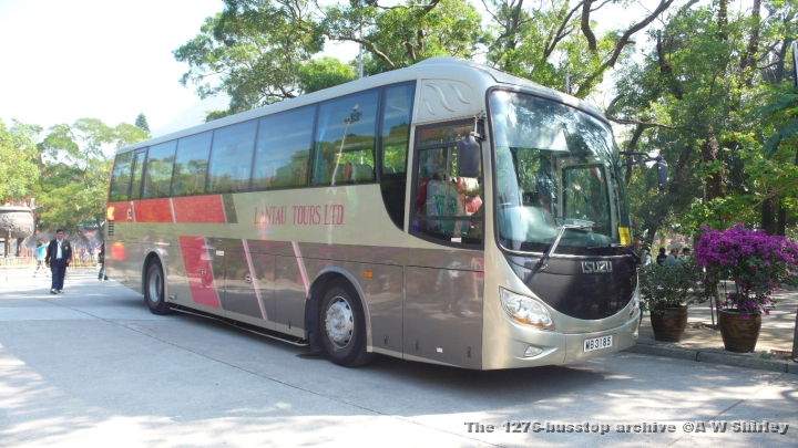 ltlmb318501241108.JPG - New Lantau Tours Isuzu Coach MB3185 Seen Parked Near The Monastery
